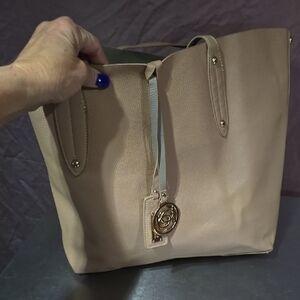 Bebe Tan Tote with Gold Charm and Sturdy Handles
